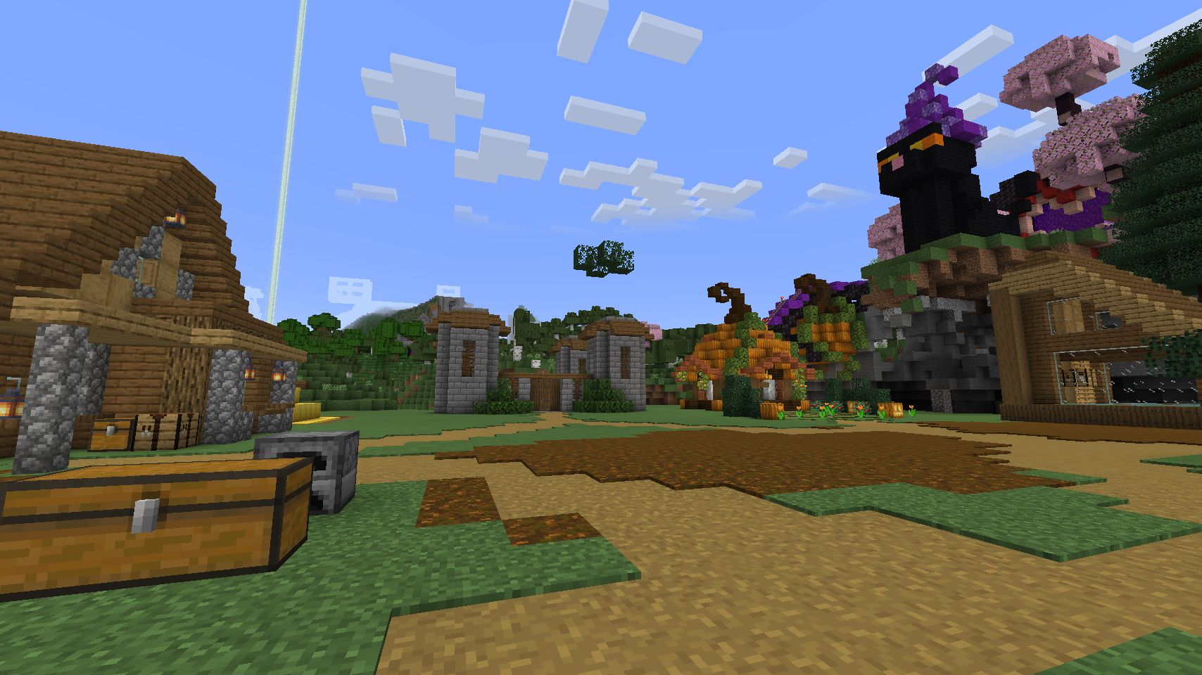 DJ facing a crowd at his deck. Photo with a purple hue